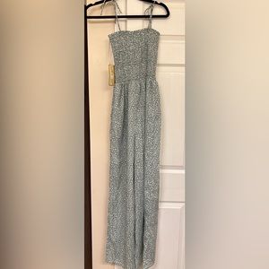 Green romper with white spots (BRAND NEW WITH TAGS)